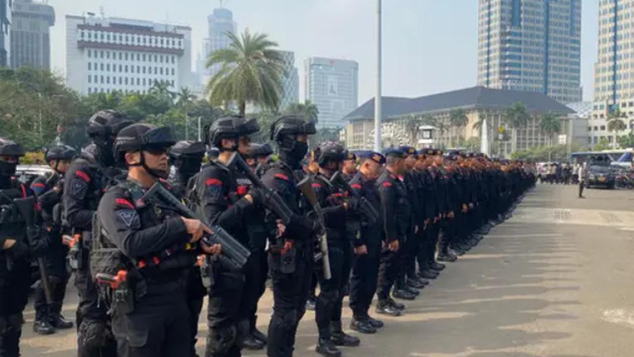 Petugas gabungan dalam pengamanan aksi 411/Liputan6
