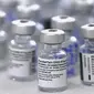 Badan Pengawas Obat dan Makanan Amerika Serikat (FDA) menyetujui penggunaan vaksin Pfizer-BioNTech untuk anak-anak dengan batasan usia 12-15 tahun. (AFP/Luis Acosta)