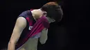 Pemain Korea Selatan, Lee Dong Keun terlihat sedih usai kalah dari Pemain Indonesia, Antthony Ginting pada semifinal Piala Thomas di Kunshan, China (20/5/2016). (AFP/ Johannes Eisele)