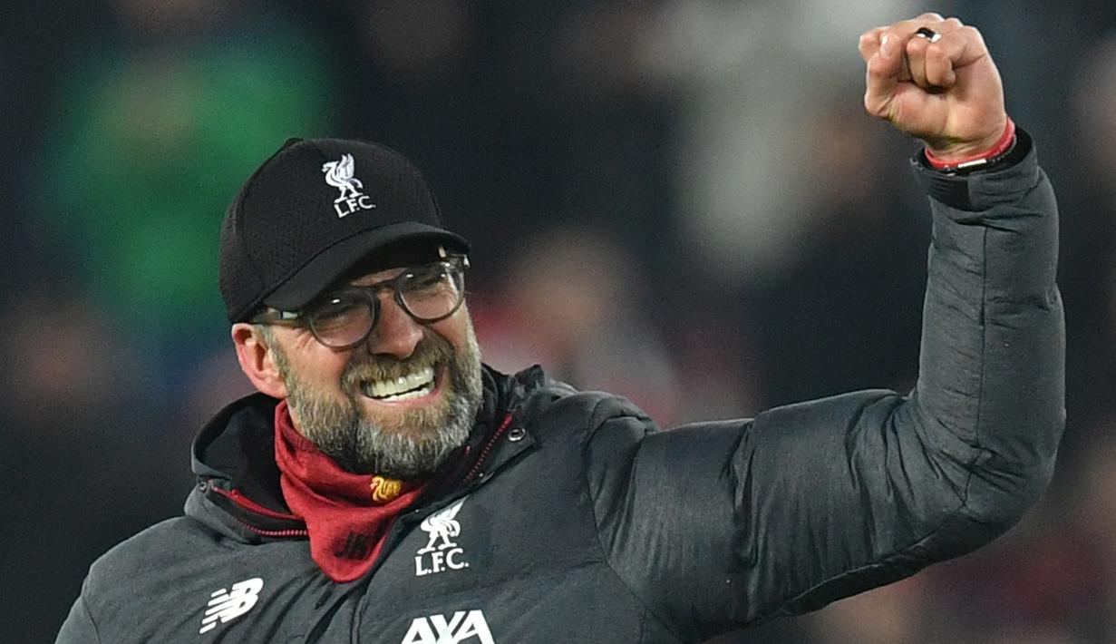 Jurgen Klopp (24 juta euro) - Jurgen Klopp dianggap telah mengembalikan Liverpool ke masa kejayaan. Pelatih berusia 52 tahun ini dibayar 24 juta euro dalam setahun oleh Liverpool. (AFP/Paul Ellis)