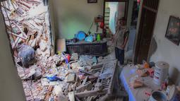 Ledakan dahsyat mengguncang kawasan permukiman Pondok Cabe Ilir, Pamulang, Tangerang Selatan, Banten, Jumat (12/9/2025) dini hari. (merdeka.com/Arie Basuki)