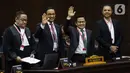 Calon presiden dan calon wakil presiden nomor urut 01, Anies Baswedan dan Muhaimin Iskandar hadir dalam sidang putusan perkara Perselisihan Hasil Pemilihan Umum (PHPU) atau putusan sidang sengketa Pilpres 2024 di Mahkamah Konstitusi (MK), Senin (22/4/2024). (Liputan6.com/Angga Yuniar)