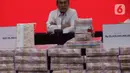 Selain uang, KPK juga sudah menyita puluhan aset lainnya milik Lukas yakni satu unit apartemen di Jakarta senilai Rp2 miliar. (Liputan6.com/Herman Zakharia)