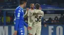 Bek AC Milan, Theo Hernandez berselebrasi dengan rekannya Alexis Saelemaekers usai mencetak gol ke gawang Empoli pada pertandingan Liga Serie A Italia di Stadion Carlo Castellani di Empoli, Italia, Kamis (23/12/2021). Kemenangan ini membuat AC Milan berada di posisi kedua klasemen dengan 42 poin. (A