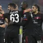 Para pemain AC Milan merayakan gol Patrick Cutrone  ke gawang FK Austria-Wien pada laga grup D Liga Europa di San Siro stadium, Milan, (23/11/2017). Milan menang telak 5-1. (AFP/Miguel Medina)