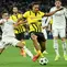 Bek Real Madrid asal Spanyol Lucas Vazquez (kiri) berebut bola dengan gelandang Borussia Dortmund asal Jerman Felix Nmecha selama pertandingan sepak bola hari ke-3 fase liga Liga Champions UEFA antara Real Madrid CF dan Borussia Dortmund di stadion Santiago Bernabeu di Madrid pada 22 Oktober 2024.Pierre-Philippe MARCOU / AFP