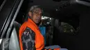 Kepala Pusat SDM Direktorat Hubla Djoko Pranomo memasuki mobil usai menjalani pemeriksaan sebagai tersangka dalam kasus dugaan korupsi Balai Pendidikan dan Pelatihan Ilmu Pelayaran Sorong tahap III, Jakarta, Rabu (2/3/2016). (Liputan6.com/Helmi Afandi)