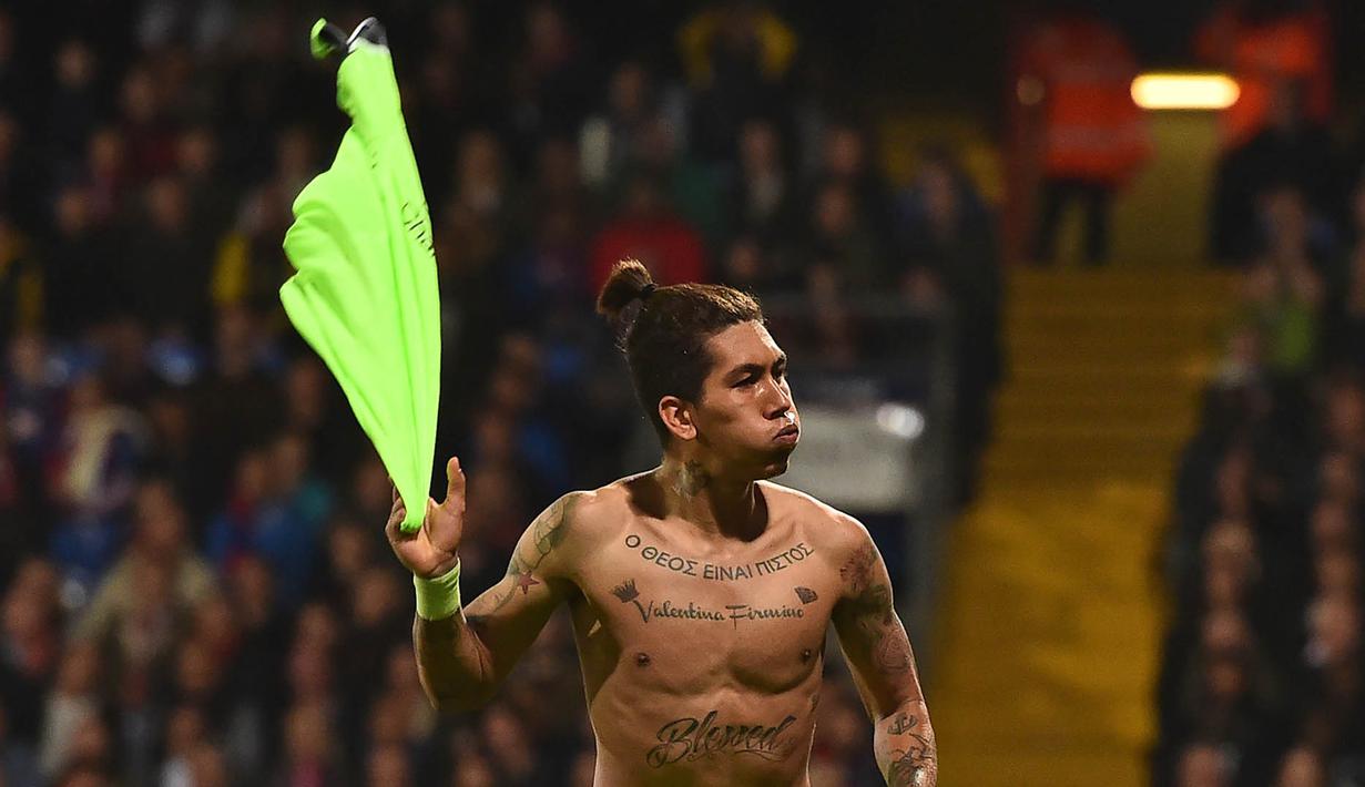 6. Roberto Firmino (Liverpool) - 14 gol dan 7 assist, total 21. (AFP/Glyn Kirk)