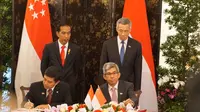 Pemerintah Indonesia dan Singapura sepakati kerja sama dalam bidang e-Government di Singapura, Selasa (28/7/2015). (Foto: Humas KemenPANRB)