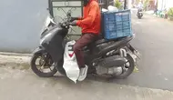 Sisi Pahit Kurir Paket, Terjerat Suspend hingga Ongkir Terpangkas