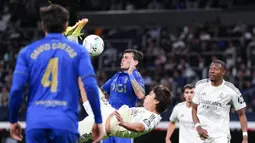 Gonzalo Garcia membuka keunggulan Madrid menjelang turun minum lewat aksi pada menit ke-44. (AP Photo/Manu Fernandez)