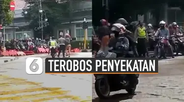 Beredar video rombongan pengendara motor nekat menjebol dan menerobos penyekatan jalur di ruas simpang Jalan Aceh - Merdeka, Bandung.