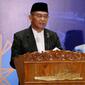 Menko PMK Muhadjir Effendy saat memberi amanat dan pesan Idul Adha 1443 H pada perayaan takbir nasional di Masjid Istiqlal Jakarta, Sabtu (9/7/2022). (Dok Kemenko PMK RI)