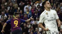 Penyerang Barcelona, Luis Suarez, mencetak dua gol saat timnya menang 3-0 atas Real Madrid pada leg kedua Copa del Rey, di Santiago Bernabeu, Rabu (27/2/2019). (AFP/Javier Soriano)