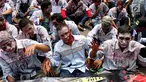 Massa buruh awak mobil tangki (AMT) berdandan seperti zombi melakukan aksi di depan gedung Pertamina, Jakarta, Senin (23/10). (Liputan6.com/Angga Yuniar)