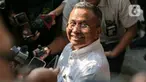 Mantan Menteri Badan Usaha Milik Negara (BUMN) Dahlan Iskan seusai menjalani pemeriksaan oleh penyiidik Komisi Pemberantasan Korupsi (KPK) di Gedung Merah Putih KPK, Jakarta, Kamis (14/9/2023). (Liputan6.com/Faizal Fanani)