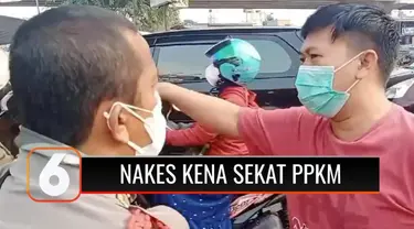 Dua tenaga kesehatan yang hendak masuk ke wilayah Bekasi, Jawa Barat, dilarang melintas karena penyekatan jalan. Sebagai pekerja yang masuk dalam kategori esensial, mereka pun protes, namun aparat bergeming.