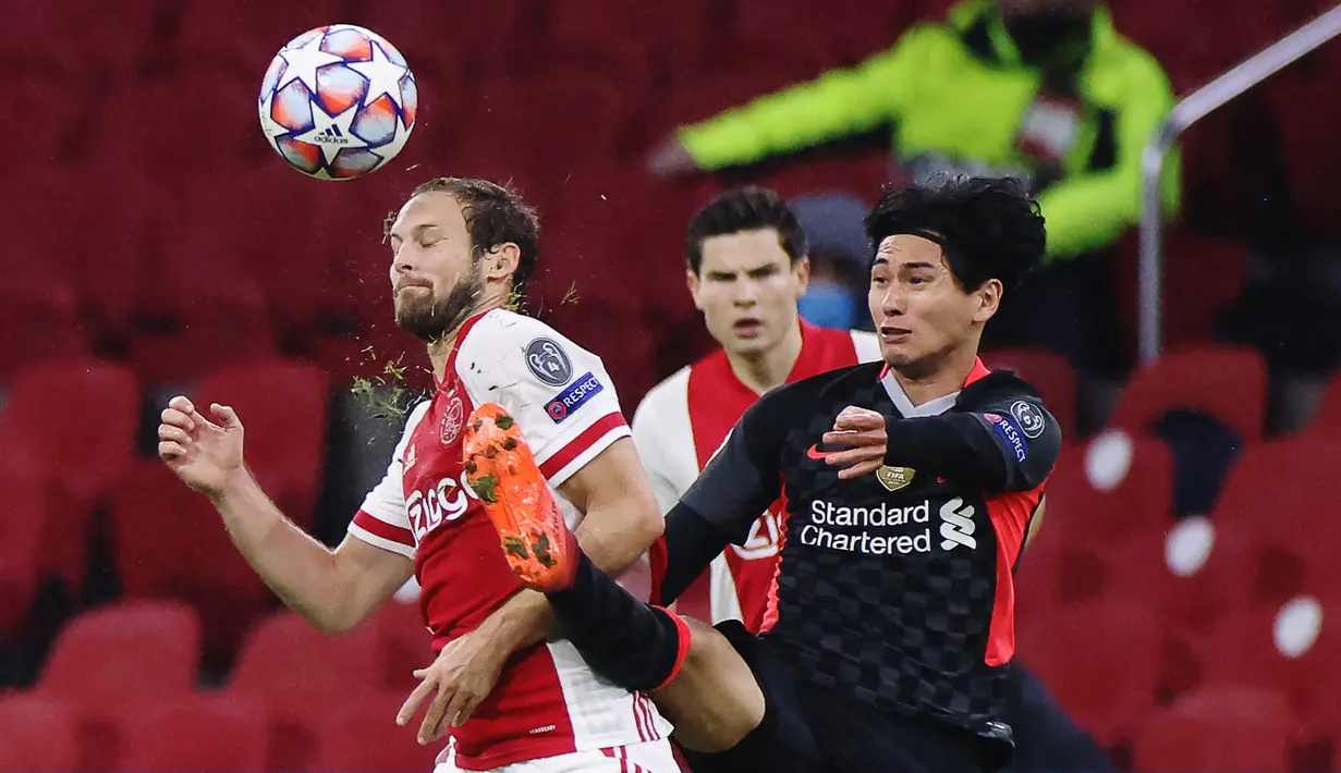 akumi Minamino. Gelandang asal jepang ini didatangkan Liverpool pada pertengahan musim 2019/2020 dari Red Bull Salzburg dengan nilai transfer 7,25 juta Poundsterling. Ia lebih tertarik dengan rencana jurgen Klopp dibanding penawaran dari Mancester United. (AFP/Kenzo Tribouillard)