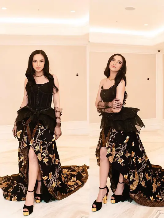 <p>Atasan tersebut dipadukan dengan rok batik model asimetris. Gaun tersebut dibuat oleh fashion designer @ohayosarah. [@lyodraofficial]</p>