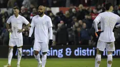 Pengoleksi gelar Piala FA terbanyak dengan 14 gelar, Arsenal harus tersisih di babak ketiga Piala FA 2021/2022 usai takluk 0-1 dari klub Championship Nottingham Forest, Minggu (9/1/2022). Gol tunggal Nottingham Forest dicetak Lewis Grabban pada menit ke-83. (AP/Rui Vieira)