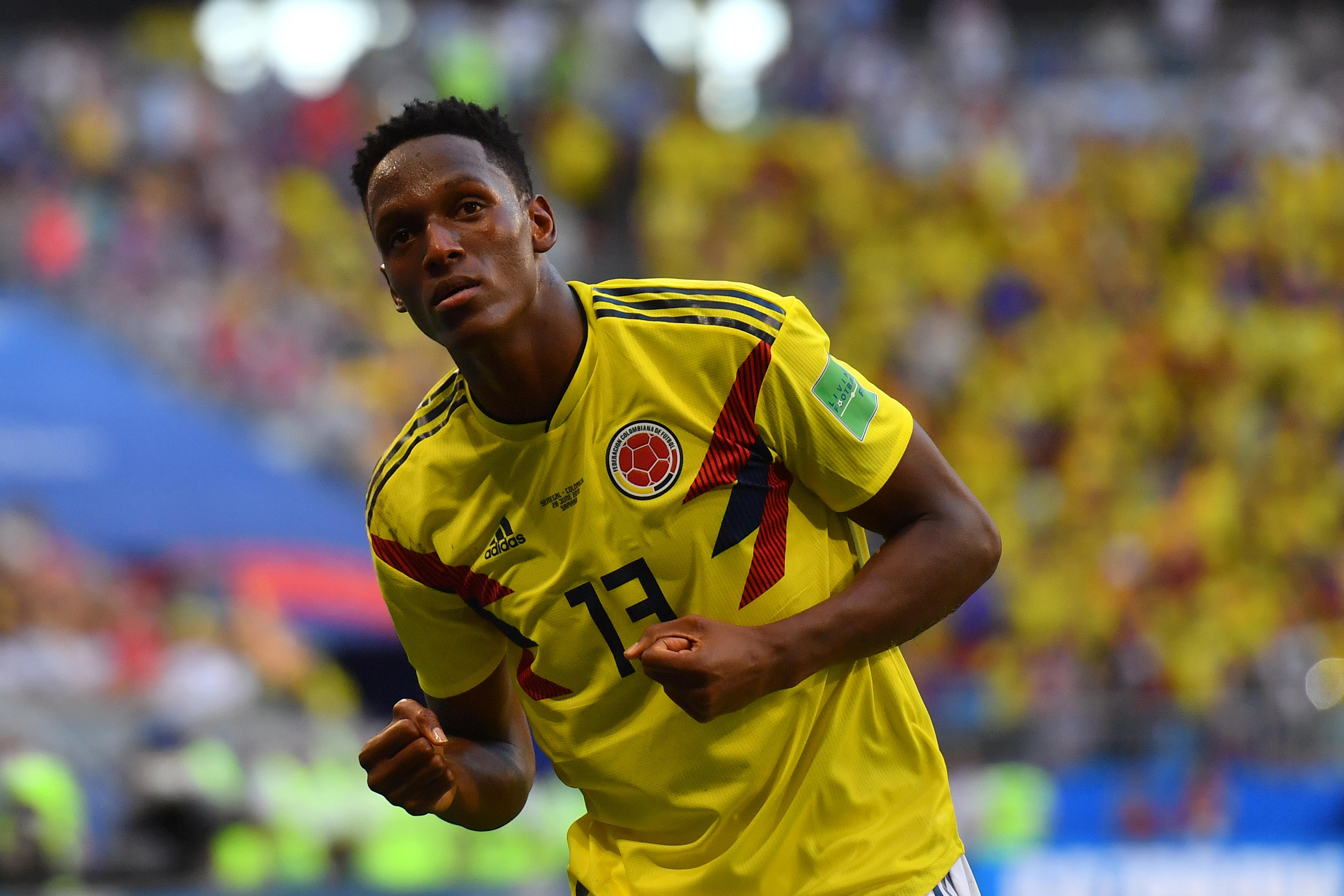Bek Kolombia Yerry Mina merayakan gol ke gawang Jepang pada laga Grup H Piala Dunia  2018 di Cosmos Arena, Kamis (28/6/2018). (AFP/Manan Vatsyayana)