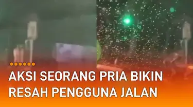 Seorang pria ganggu pengguna jalan mengundang perhatian. Aksi itu terjadi di Jalan Kemang Raya, Jakarta Selatan.