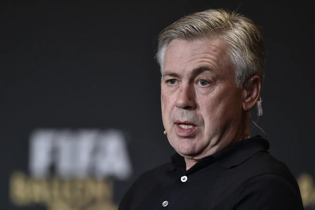 Carlo Ancelotti memberikan dukungan kepada tim nasional Prancis untuk menjadi juara di Piala Eropa 2016 (AFP PHOTO / FABRICE COFFRINI)