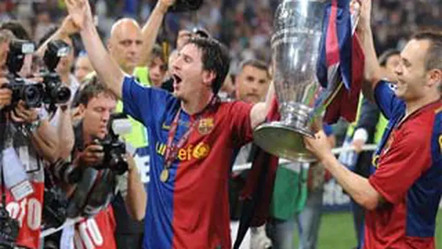 Lionel Messi dan Andres Iniesta