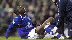 Everton's Louis Saha lies injured before being carried off during their EPL football match against Tottenham Hotspur at White Hart Lane, on November 30, 2008 in London. AFP PHOTO/ CHRIS RATCLIFFE