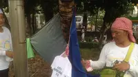 Diserbu Massa Demo 212, Pedagang Kaus Ini Kebanjiran Untung