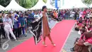 Keikutsertaan Sarinah dalam merayakan hari batik nasional menjadi salah satu upaya menunjukkan komitmen untuk terus menjadikan batik sebagai bagian dari kerajinan dan warisan khas Indonesia, Jakarta, Minggu (2/10). (Liputan6.com/Angga Yuniar)