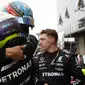Ini adalah kemenangan perdana pebalap asal Inggris tersebut di ajang balap Formula 1. Ia sukses mencatatkan waktu 1:38:34 dalam 71 laps. (AP/Marcelo Chello)