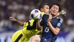 Bertandang ke markas Samurai Biru, skuad Garuda menelan kekalahan telak dengan skor 0-6. (PAUL MILLER/AFP)