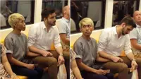 Pengguna jejaring sosial diramaikan dengan beredarnya posting-an foto dua pria yang terlihat mesra dalam sebuah gerbong kereta api.