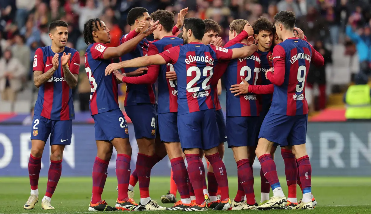 Barcelona tampil impresif membungkam Getafe dengan skor telak 4-0. (LLUIS GENE/AFP)