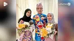 Seorang pria di Malaysia memakai baju pengantin bermotif Doraemon saat pernikahannya.