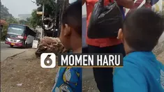 Sang anak nampak kegirangan bertemu ayahnya meski hanya sejenak di tepi jalan.