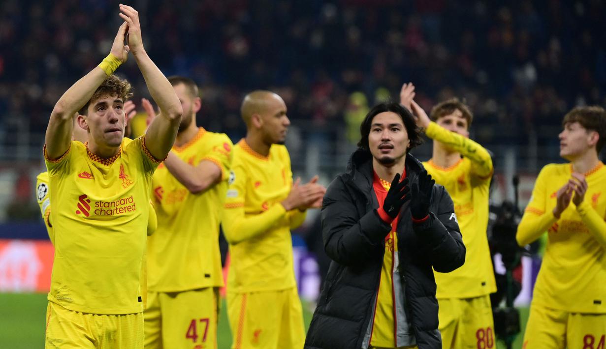 Sementara itu, Liverpool tetap kokoh di puncak klasemen dengan gelar tak terkalahkan di fase grup. The Reds berhasil meraih poin sempurna di Grup B dan sukses melenggang ke babak 16 besar. (AFP/Miguel Medina)