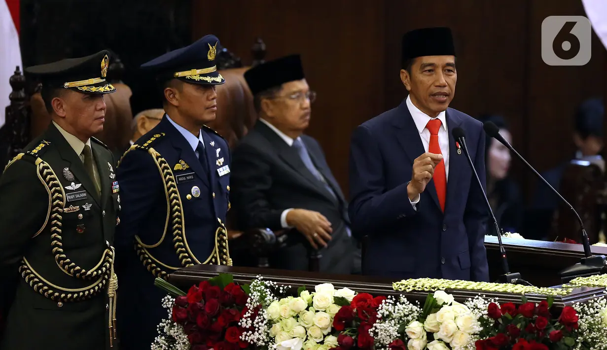Joko Widodo atau Jokowi memberikan pidato perdana usai dilantik menjadi Presiden RI periode 2019-2024 di Gedung Nusantara, Jakarta, Minggu (20/10/2019). Jokowi dan Ma'ruf Amin resmi dilantik sebagai Presiden dan Wakil Presiden RI periode 2019-2024. (Liputan6.com/JohanTallo)