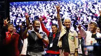 Calon presiden Ganjar Pranowo dalam acara Pesta Rakyat Ganjar-Mahfud yang digagas oleh Sahabat Ganjar di Lapangan Puputan Margarana Niti Mandala, Denpasar, Bali, Sabtu malam (20/1/2024). (Liputan6.com/Muhammad Radityo Priyasmoro)
