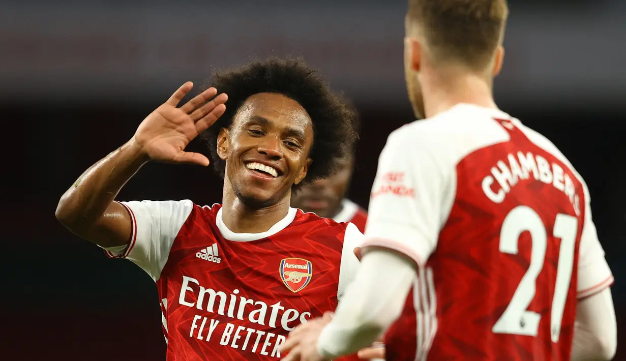 Willian. Sayap kiri Brasil berusia 33 tahun yang sejak awal musim 2021/2022 memperkuat Corinthians ini sebelumnya berseragam Arsenal selama 1 musim pada 2020/2021. Ia didatangkan dari sesama klub Liga Inggris, Chelsea pada awal musim 2020/2021 dengan status bebas transfer. Bersama Arsenal ia total tampil dalam 37 laga di semua ajang dengan torehan 1 gol dan 7 assist. (AFP/Pool/Richard Heathcote)