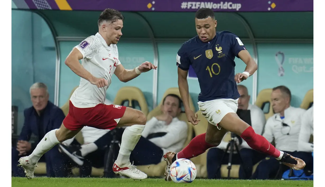 Kylian Mbappe menjadi pemain Prancis pertama yang mencetak empat gol lebih dalam dua edisi Piala Dunia. Mbappe telah mencetak empat gol di Piala Dunia 2018 dan 5 gol di Piala Dunia 2022. (AP Photo/Ricardo Mazalan)