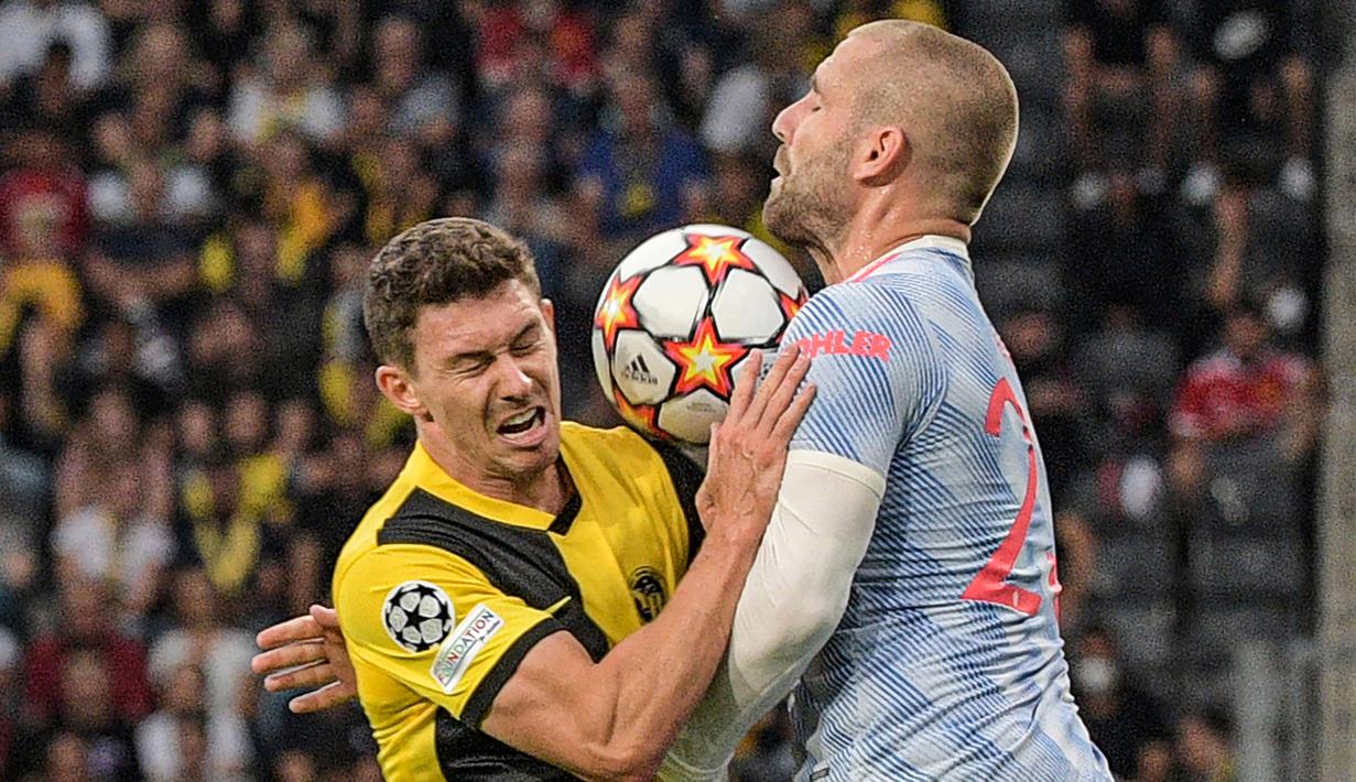 Hingga babak kedua berjalan 15 menit, Luke Shaw dan kawang-kawan terus digempur oleh lini depan Young Boys yang menyadari keunggulan jumlah pemain. (Foto: AFP/Sebastien Bozon)