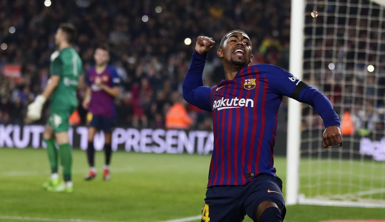 Striker Barcelona, Malcom, melakukan selebrasi usai mencetak gol ke gawang Cultural Leonesa pada laga Copa del Rey di Stadion Camp Nou, Rabu (5/12). Barcelona menang 4-1 atas Cultural Leonesa. (AP/Manu Fernandez)