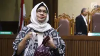 Mantan Dirut PT Pertamina (Persero), Karen G Agustiawan usai menjalani sidang lanjutan di Pengadilan Tipikor, Jakarta, Kamis (14/2). Sidang beragendakan pembacaan jawaban atas eksepsi terdakwa oleh Jaksa Penuntut Umum. (Liputan6.com/Helmi Fithriansyah)