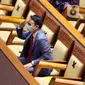 Wakil Menteri Perdagangan Jerry Sambuaga saat sidang paripurna DPR di Jakarta, Selasa (23/3/2021). DPR menunda Pembicaraan Tingkat II/Pengambilan Keputusan RUU Pengesahan Persetujuan Kemitraan Ekonomi Komprehensif Antara Republik Indonesia dan Negara-Negara EFTA. (Liputan6.com/Angga Yuniar)