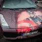 Lamborghini Gallardo akan memperlihatkan cat bergambar Captain America saat disiram air hangat (Foto: Carscoops). 