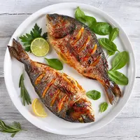 Ilustrasi ikan bakar bumbu kuning./Copyright shutterstock.com/g/oksanazh