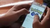 Masyarakat umum kerangjingan permainan Pokemon Go. 