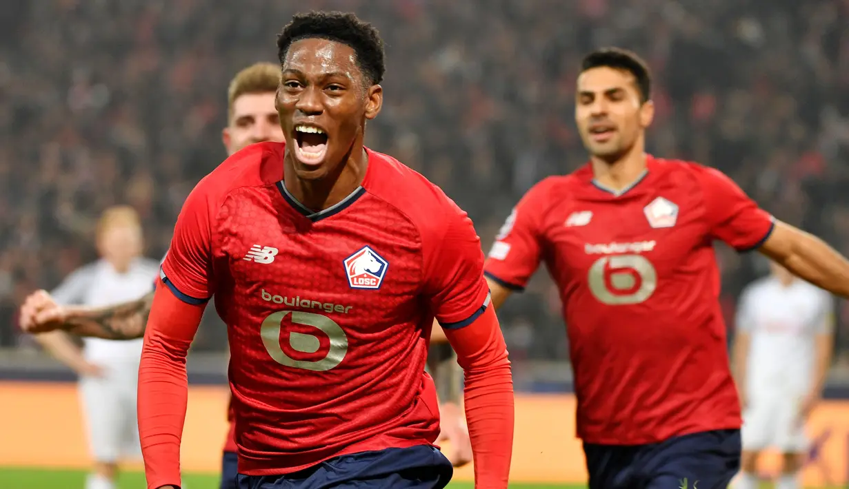 Jonathan David - Striker Lille ini menjadi salah satu pemain tersubur di Ligue 1 2021/2022. Sejauh ini, ia sudah mengemas 11 gol dari total 17 laga. Sayangnya, produktivitas itu tak banyak membantu klub karena untuk sementara Lille berada di posisi ke-12 klasemen sementara. (AFP/Denis Charle)